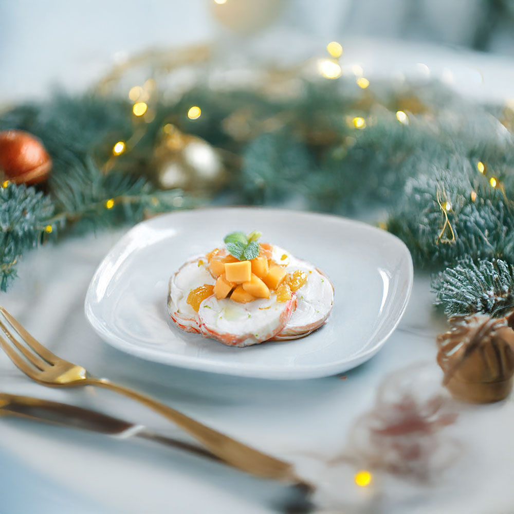 Médaillons de Langouste Australe & sa sauce aux Mangues Josés